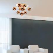 Kattovalaisin Explosion kuparivärisillä palloilla