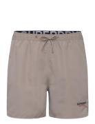 Sportswear Emb 15 Swim Short Uimashortsit Beige Superdry