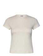 Slim Short-Sleeved Cotton T-Shirt Tops T-shirts & Tops Short-sleeved C...