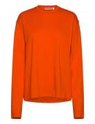 Long-Sleeved Boxy Cotton T-Shirt Tops T-shirts & Tops Long-sleeved Ora...