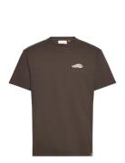 Application T-Shirt Tops T-shirts Short-sleeved Brown Revolution